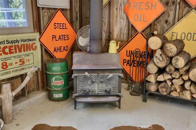 5027 Fox Creek Rd, Mariposa, CA 95338 - detailed view of concrete floors and a wood stove