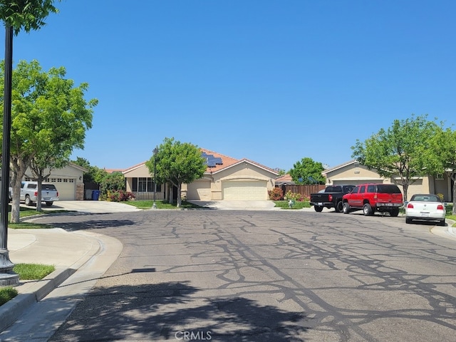 511 Milano Ct, Los Banos, CA 93635 - view of asphalt street with curbs