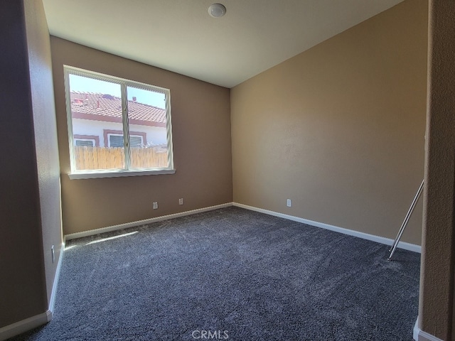511 Milano Ct, Los Banos, CA 93635 - spare room with dark carpet and baseboards
