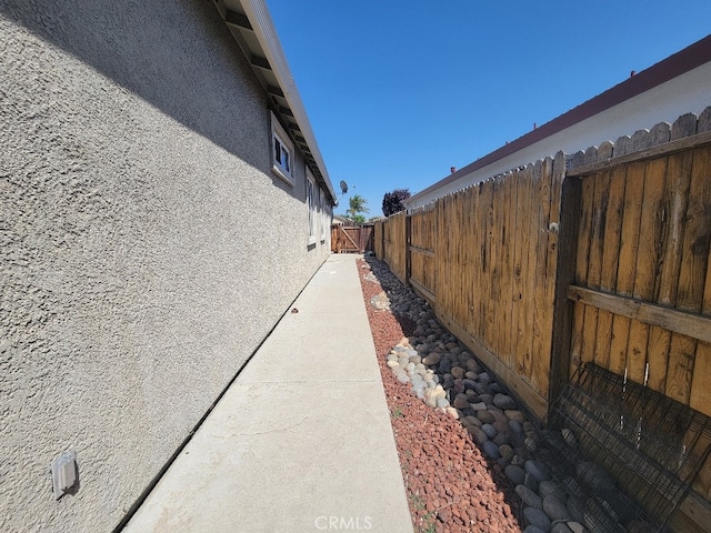 511 Milano Ct, Los Banos, CA 93635 - view of side of home featuring stucco siding