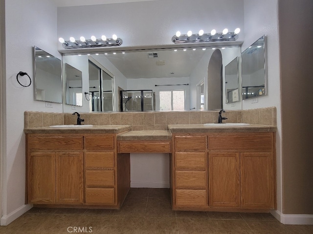 511 Milano Ct, Los Banos, CA 93635 - full bathroom featuring double vanity and tile patterned floors