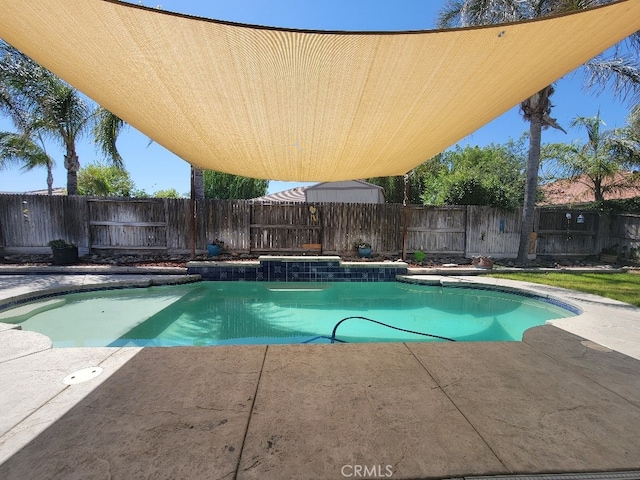 511 Milano Ct, Los Banos, CA 93635 - view of swimming pool featuring a patio area and a fenced backyard