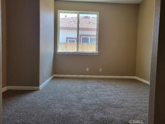 511 Milano Ct, Los Banos, CA 93635 - carpeted spare room featuring baseboards