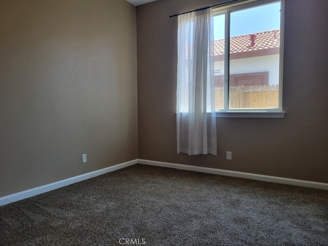 511 Milano Ct, Los Banos, CA 93635 - empty room featuring carpet flooring and baseboards