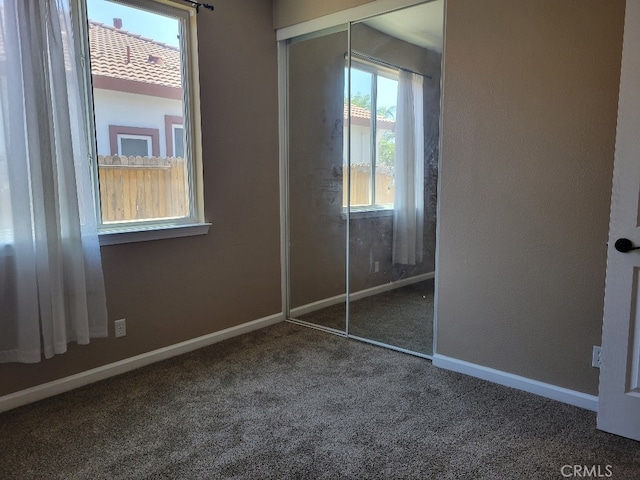 511 Milano Ct, Los Banos, CA 93635 - unfurnished bedroom with carpet floors and a closet