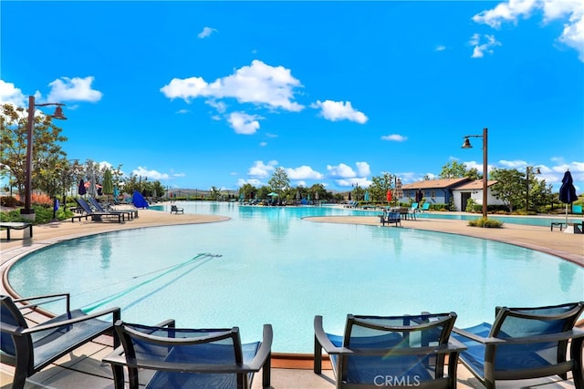 7 Abarrota St, Rancho Mission Viejo, CA 92694 - community pool featuring a patio