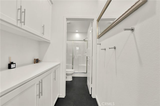 7 Abarrota St, Rancho Mission Viejo, CA 92694 - bathroom with tile patterned floors, a shower stall, toilet, vanity, and recessed lighting