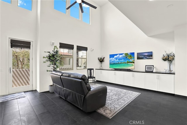 7 Abarrota St, Rancho Mission Viejo, CA 92694 - living room with a high ceiling, a ceiling fan, and baseboards