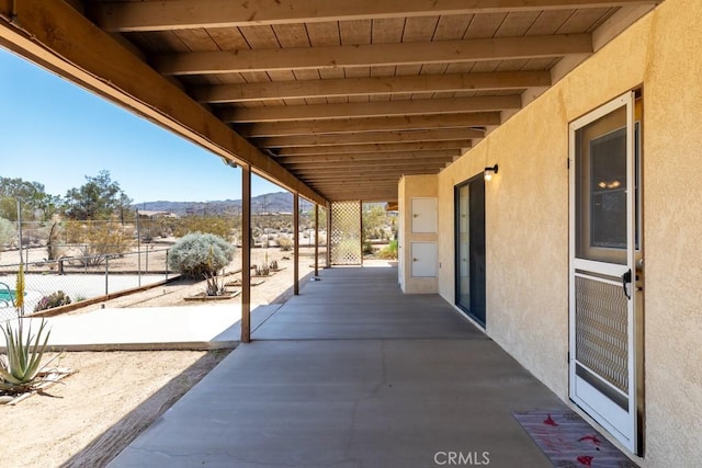 6425 Indian Cove Rd Unit 29, Palms, CA 92277 - view of patio featuring a mountain view