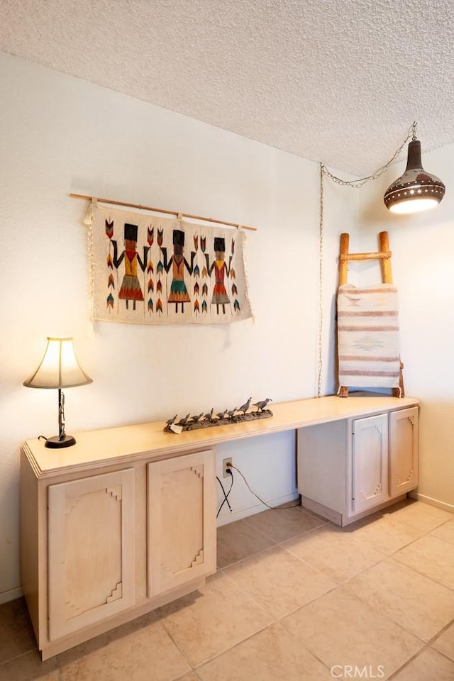 6425 Indian Cove Rd Unit 29, Palms, CA 92277 - detailed view of a textured ceiling and baseboards