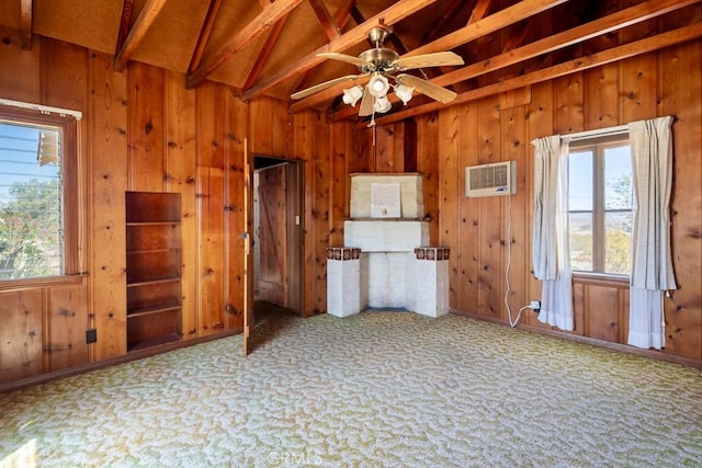6425 Indian Cove Rd Unit 29, Palms, CA 92277 - kitchen featuring wooden walls, carpet, a wall mounted air conditioner, and ceiling fan