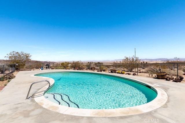 6425 Indian Cove Rd Unit 29, Palms, CA 92277 - view of swimming pool featuring a mountain view
