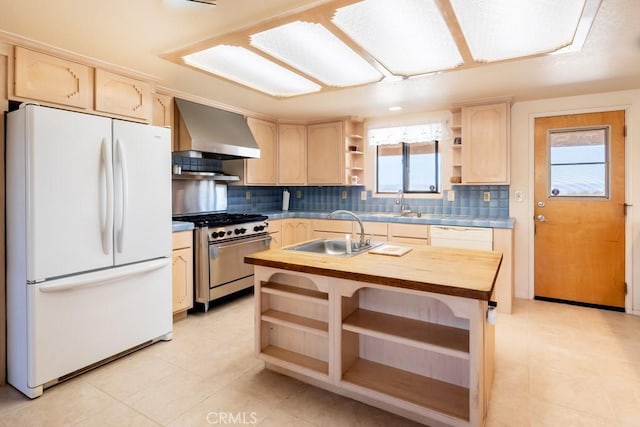 6425 Indian Cove Rd Unit 29, Palms, CA 92277 - kitchen with white appliances, open shelves, wall chimney range hood, and light brown cabinetry