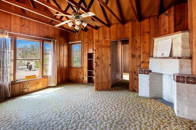 6425 Indian Cove Rd Unit 29, Palms, CA 92277 - spare room featuring wooden walls, carpet floors, and a ceiling fan