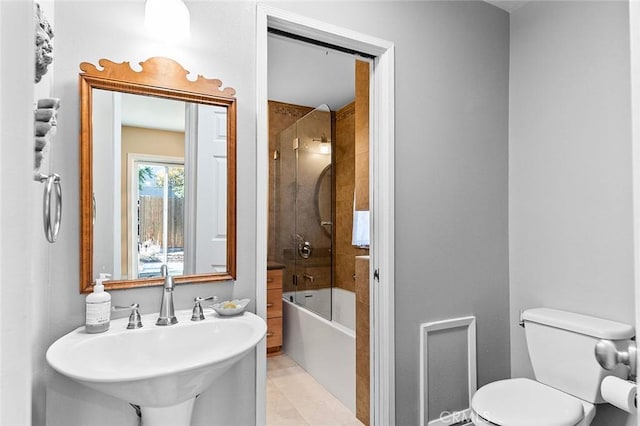 386 Los Altos Ave, Long Beach, CA 90814 - bathroom featuring toilet, shower / washtub combination, a sink, and tile patterned flooring