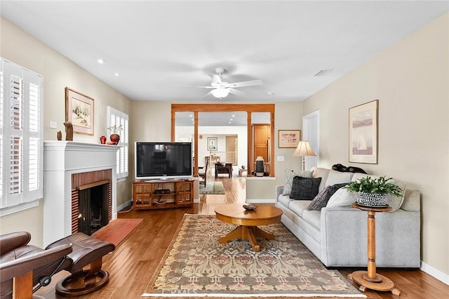 386 Los Altos Ave, Long Beach, CA 90814 - living area featuring wood finished floors, a brick fireplace, ceiling fan, baseboards, and recessed lighting