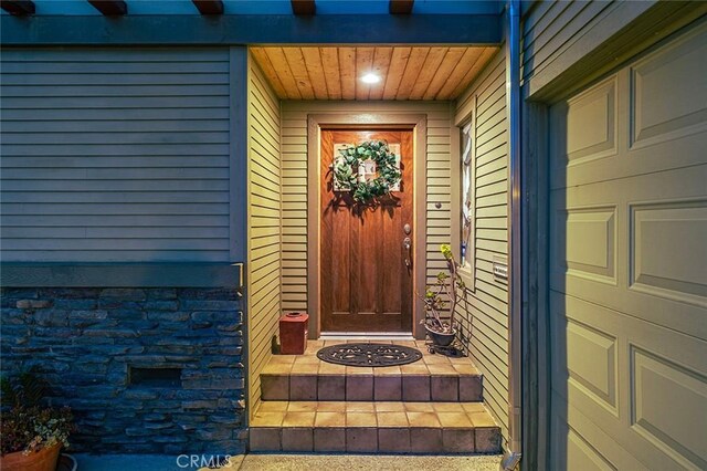 386 Los Altos Ave, Long Beach, CA 90814 - view of exterior entry featuring covered porch and stone siding