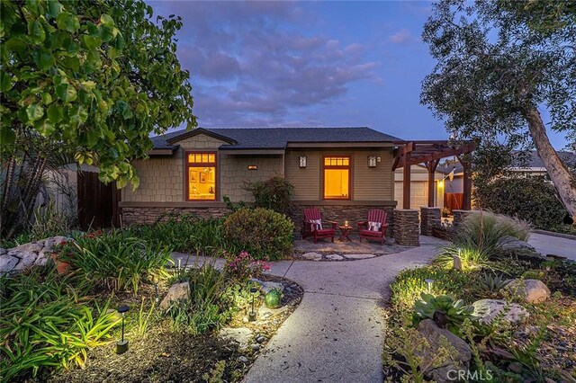 386 Los Altos Ave, Long Beach, CA 90814 - view of front of home featuring stone siding and a pergola