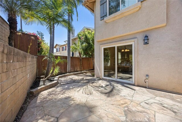 1534 Rowan Gln, Escondido, CA 92025 - fenced backyard with a patio area