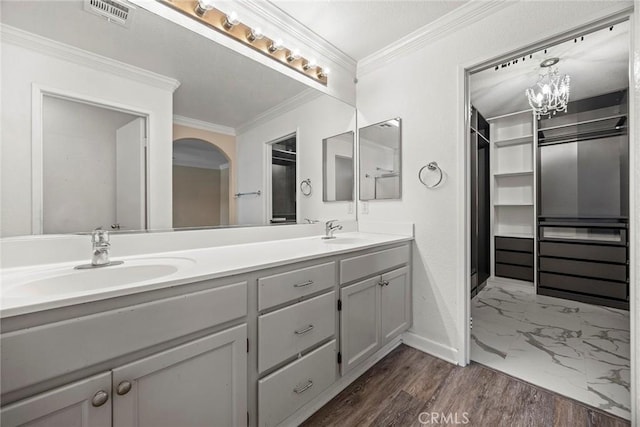 1534 Rowan Gln, Escondido, CA 92025 - bathroom with double vanity, ornamental molding, and wood finished floors