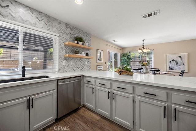 1534 Rowan Gln, Escondido, CA 92025 - kitchen with dishwasher, dark wood finished floors, a chandelier, open shelves, and backsplash