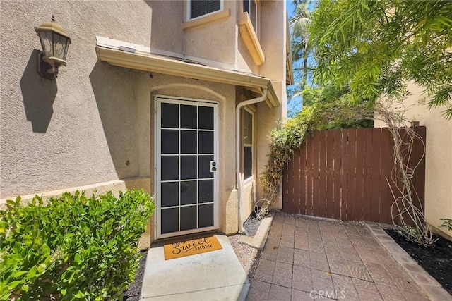 1534 Rowan Gln, Escondido, CA 92025 - entrance to property featuring stucco siding and a patio area