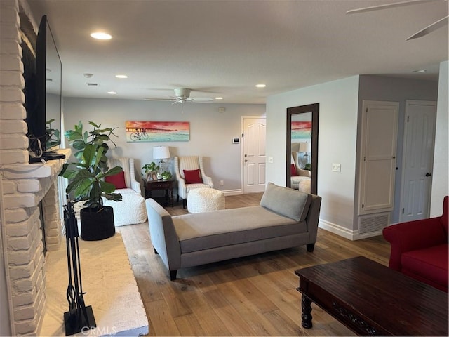 3108 Sumatra Pl, Costa Mesa, CA 92626 - living room with a ceiling fan, wood finished floors, recessed lighting, baseboards, and a fireplace