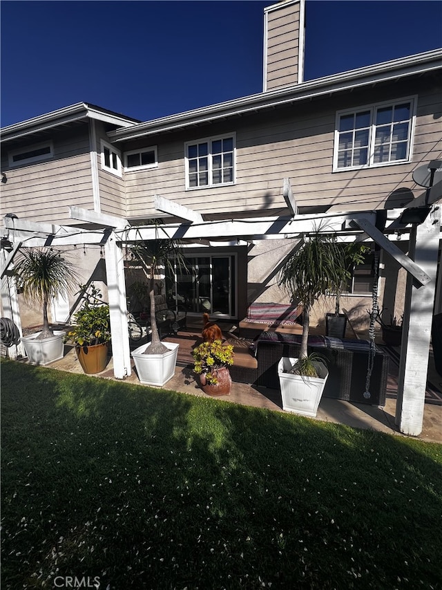 3108 Sumatra Pl, Costa Mesa, CA 92626 - rear view of house with a patio, a pergola, and a yard
