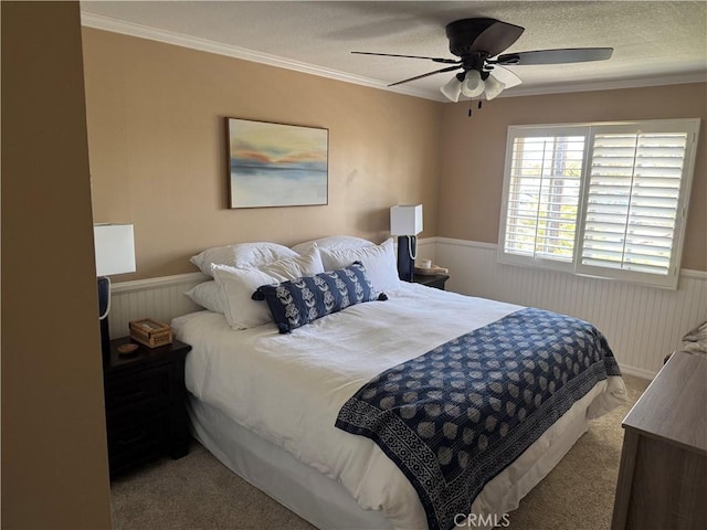 3108 Sumatra Pl, Costa Mesa, CA 92626 - bedroom featuring a wainscoted wall, carpet flooring, crown molding, ceiling fan, and a textured ceiling
