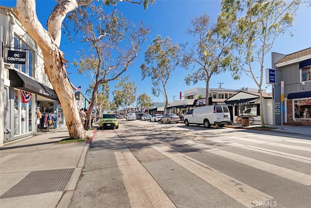 202 Onyx Ave, Newport Beach, CA 92662 - view of asphalt road featuring sidewalks, curbs, and street lights