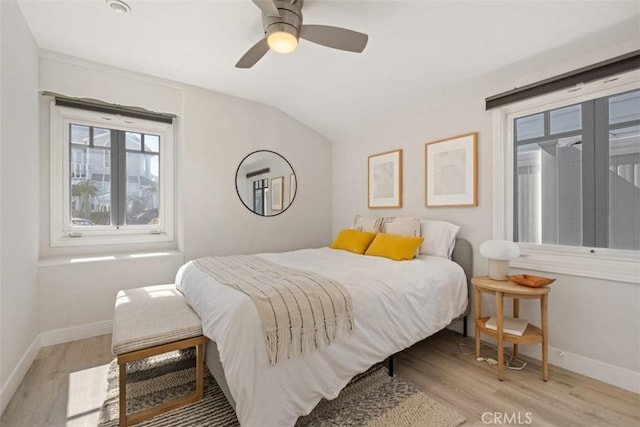 202 Onyx Ave, Newport Beach, CA 92662 - bedroom featuring baseboards, light wood-style floors, lofted ceiling, and a ceiling fan