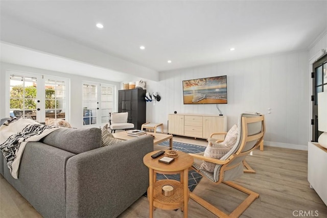 202 Onyx Ave, Newport Beach, CA 92662 - living room with french doors, light wood-style floors, recessed lighting, and baseboards