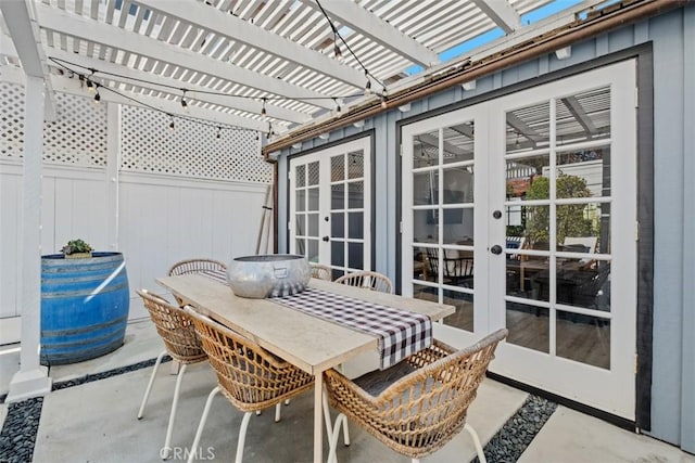 202 Onyx Ave, Newport Beach, CA 92662 - fenced backyard featuring outdoor dining space, french doors, a pergola, and a patio