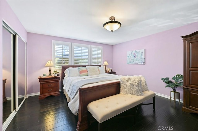 2018 Anaheim Ave, Costa Mesa, CA 92627 - bedroom featuring baseboards, a closet, and dark wood finished floors