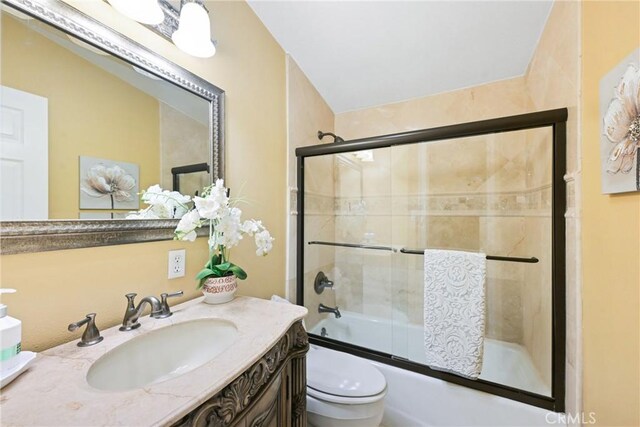 2018 Anaheim Ave, Costa Mesa, CA 92627 - full bath featuring toilet, vanity, and combined bath / shower with glass door