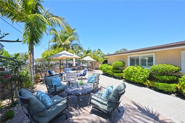 2018 Anaheim Ave, Costa Mesa, CA 92627 - view of patio / terrace featuring an outdoor hangout area and outdoor dining area