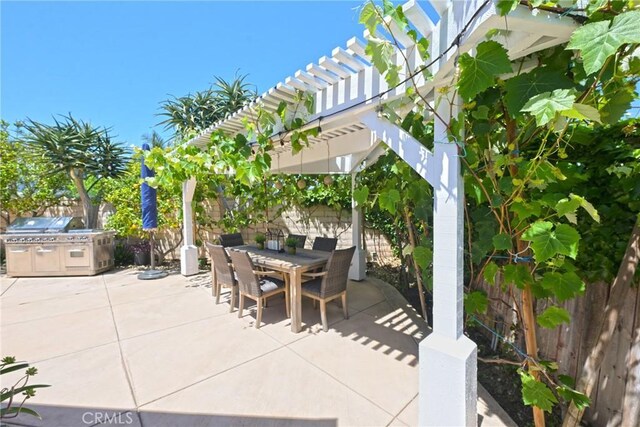 2018 Anaheim Ave, Costa Mesa, CA 92627 - fenced backyard with outdoor dining area, a pergola, and a patio area