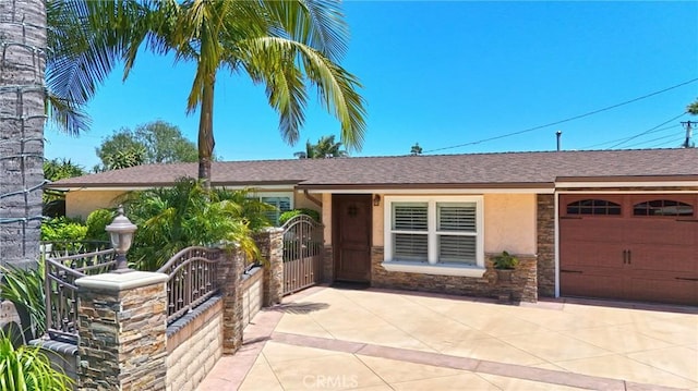2018 Anaheim Ave, Costa Mesa, CA 92627 - single story home with stucco siding, stone siding, an attached garage, and a shingled roof