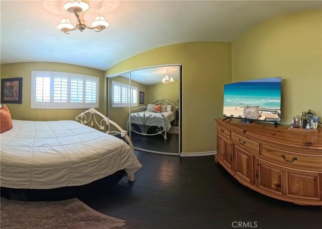 2018 Anaheim Ave, Costa Mesa, CA 92627 - bedroom featuring a chandelier, baseboards, dark wood finished floors, a closet, and vaulted ceiling