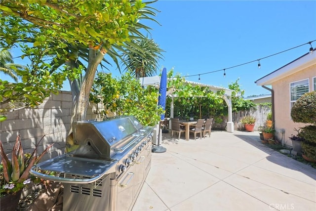 2018 Anaheim Ave, Costa Mesa, CA 92627 - fenced backyard with outdoor dining area, a patio, and area for grilling