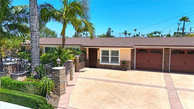 2018 Anaheim Ave, Costa Mesa, CA 92627 - ranch-style house with driveway, an attached garage, a shingled roof, stucco siding, and stone siding