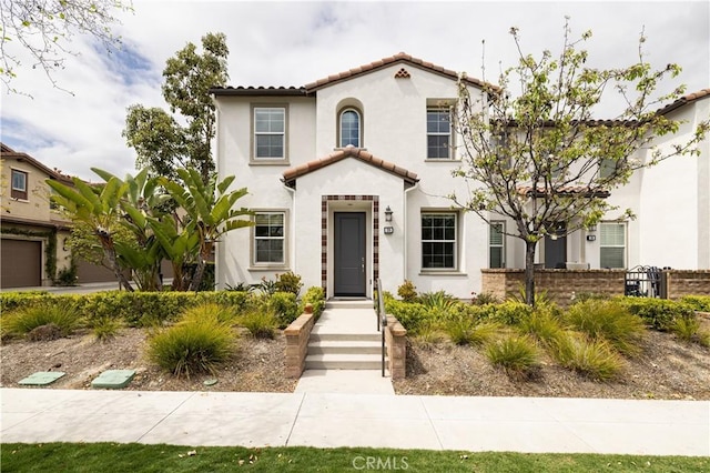 38 Gallo St, Rancho Mission Viejo, CA 92694 - mediterranean / spanish-style house with stucco siding and a tiled roof