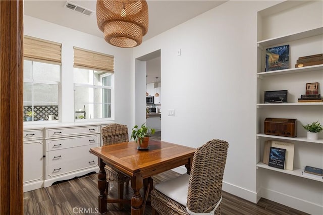 38 Gallo St, Rancho Mission Viejo, CA 92694 - dining area featuring dark wood-style flooring, an office area, and baseboards