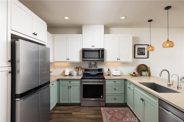 38 Gallo St, Rancho Mission Viejo, CA 92694 - kitchen with appliances with stainless steel finishes, a sink, green cabinetry, white cabinetry, and recessed lighting