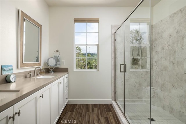 38 Gallo St, Rancho Mission Viejo, CA 92694 - full bath with wood finished floors, a shower stall, baseboards, and vanity