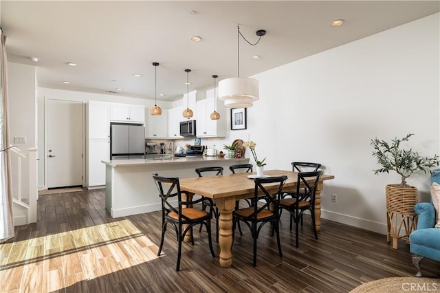 38 Gallo St, Rancho Mission Viejo, CA 92694 - dining space with dark wood-style floors, baseboards, and recessed lighting
