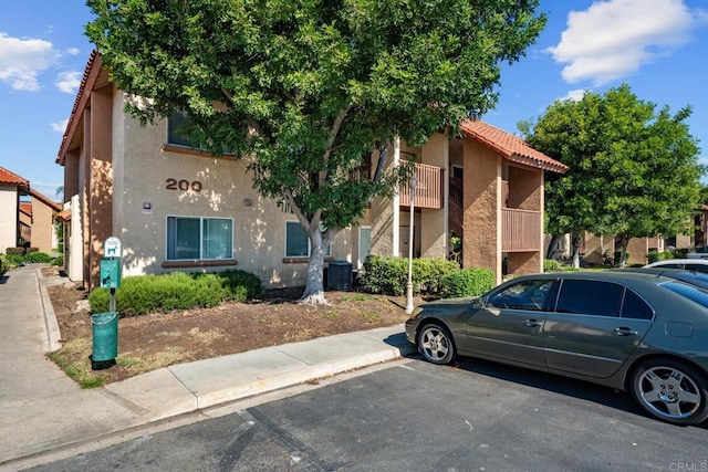 200 Chambers St Unit 19, El Cajon, CA 92020 - view of property with stucco siding and uncovered parking