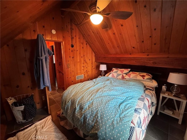 2548 Rim Of The World Dr, Running Springs, CA 92382 - bedroom featuring lofted ceiling, wood walls, and tile patterned floors