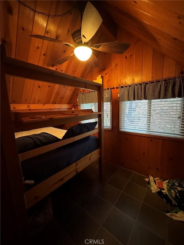 2548 Rim Of The World Dr, Running Springs, CA 92382 - tiled bedroom with wood walls and vaulted ceiling