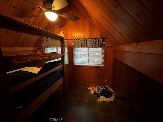 2548 Rim Of The World Dr, Running Springs, CA 92382 - bedroom with vaulted ceiling, wooden walls, and tile patterned flooring